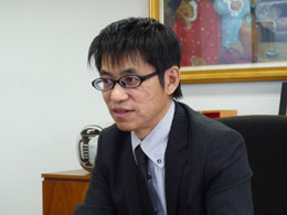 人事・情報システム部統括部長 田中